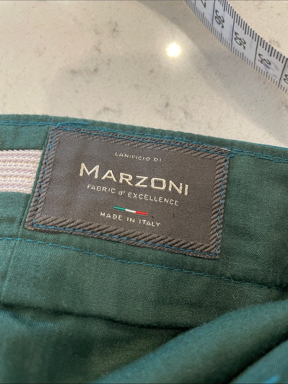 Men's  Italian Fabric Pants, two available, one green and one blue. $50 each.